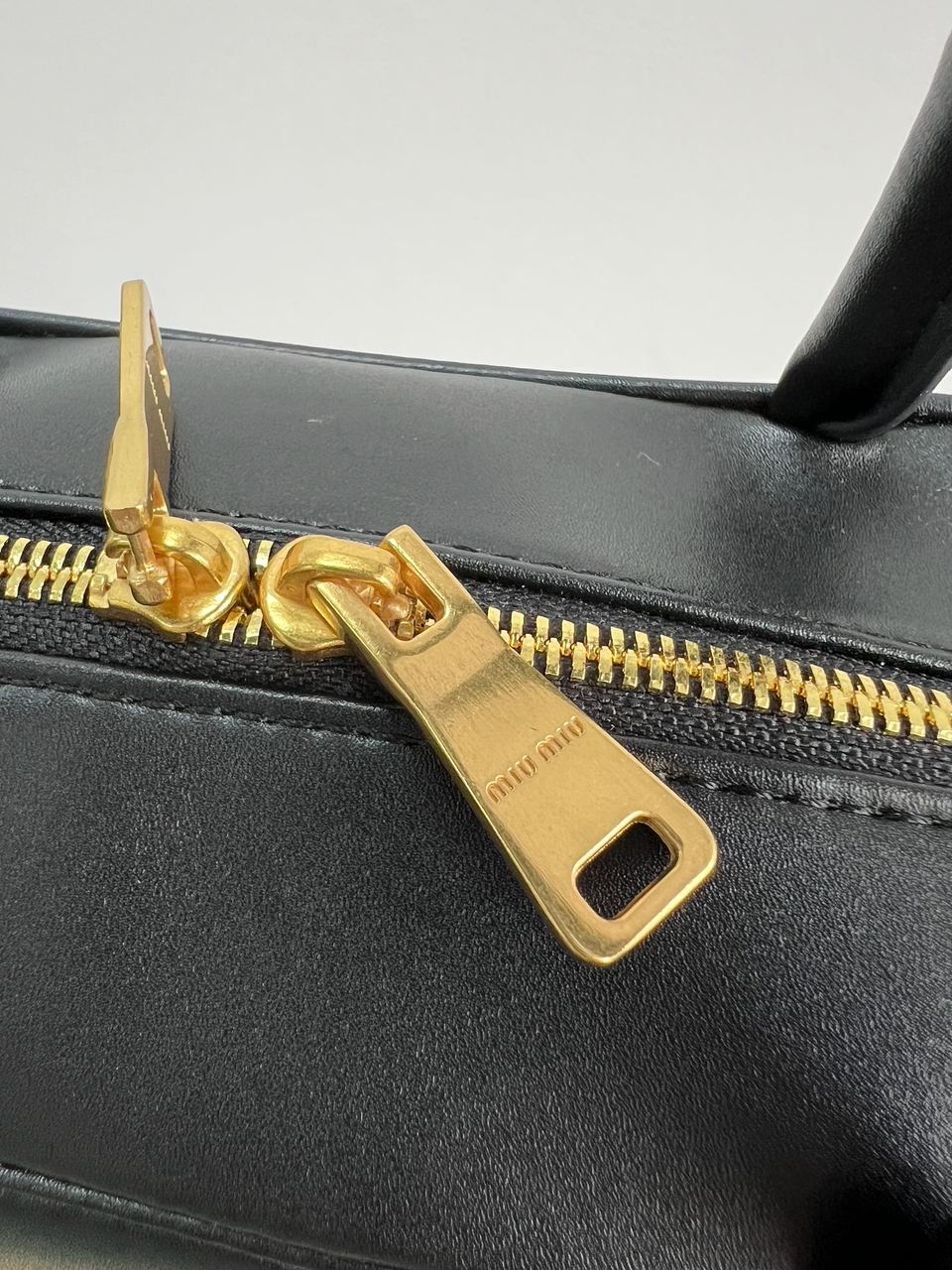 MiuMu Leather Top Handle Bag Black - 23